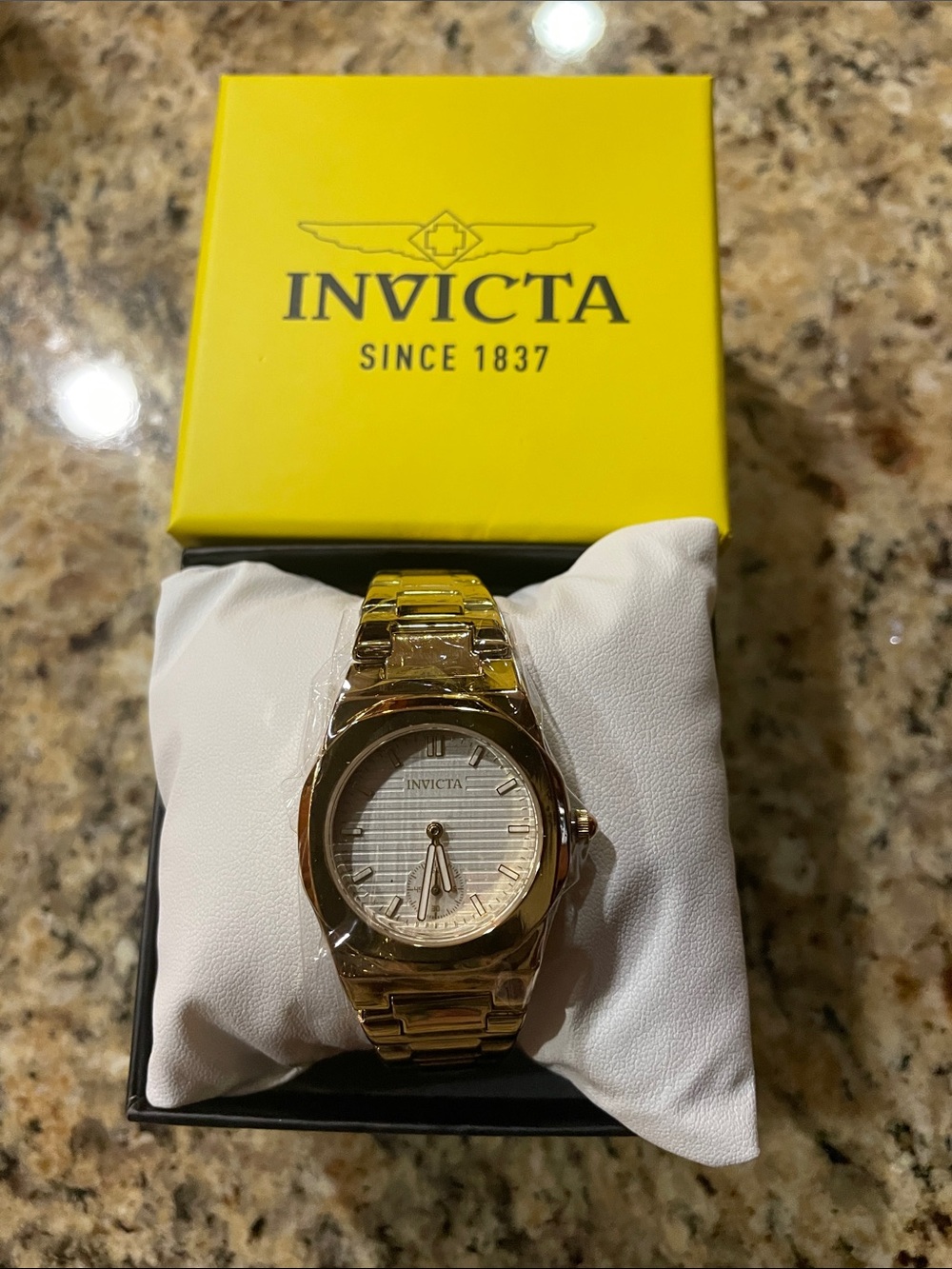Invicta Celestial Gold Tone with a White Dial